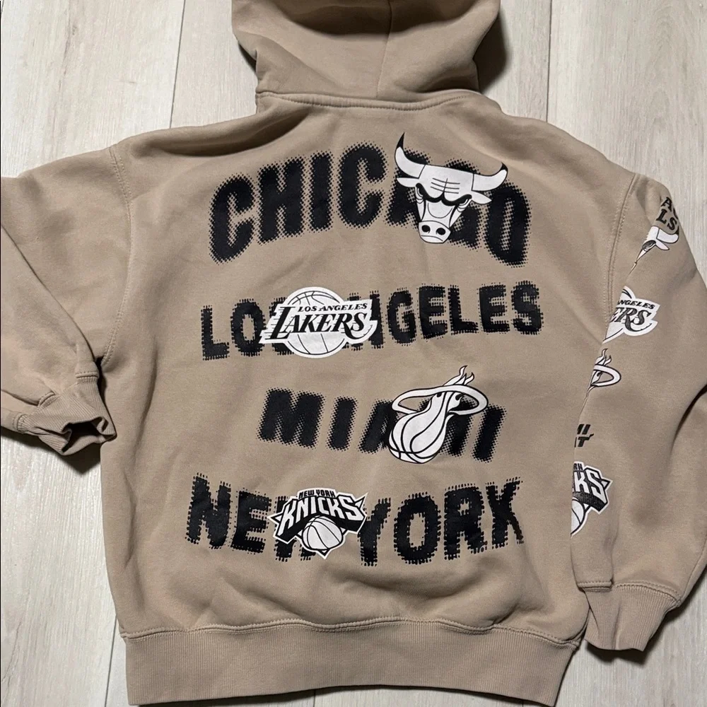 NBA Logo Kid’s Zara Beige Hooded Sweatshirt with pocket and graphics -Size 11-12